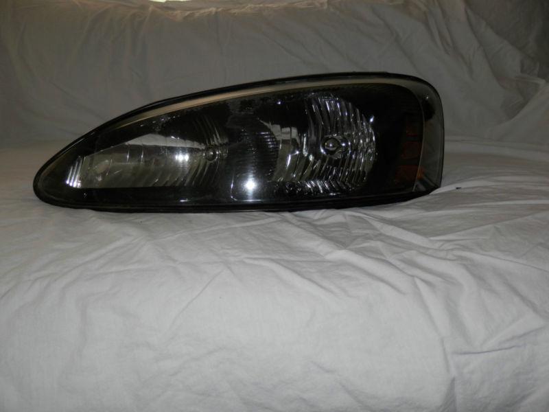 2004 pontiac grand prix headlight