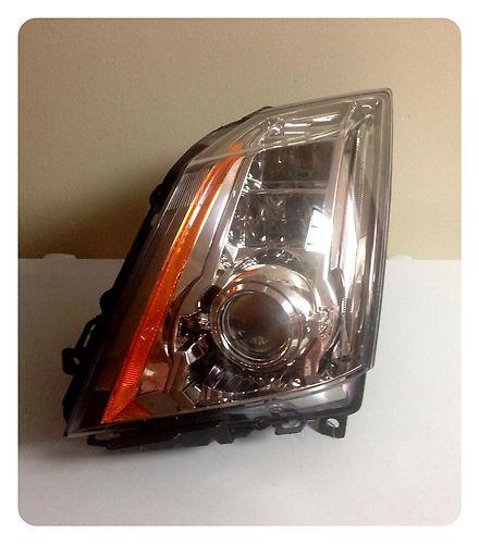 Cadillac cts 2008-2013 oem xenon hid headlight driver side (lh).