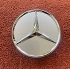 Four genuine oem mercedes benz wheel center caps in silver/chrome - nice