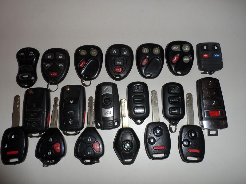 Unique lot of 19 oem keyless remotes bmw vw totota gm ford chrysler honda 