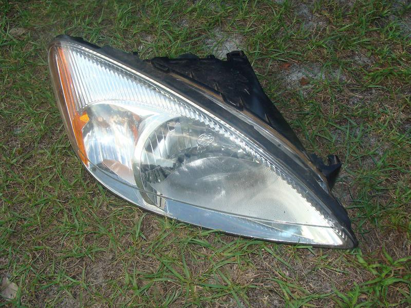 Ford taurus rh headlight 00 01 02 03 04 05 06 used oem