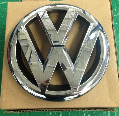 Used genuine oem front "vw" emblem with plate for 2013 vw passat models