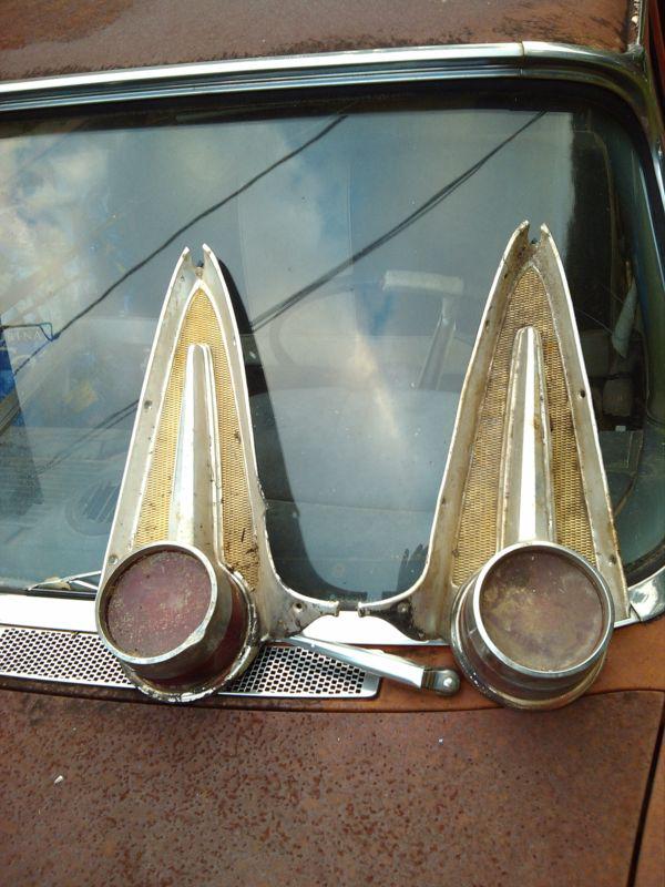 1958 fury tail light bezels trim gold