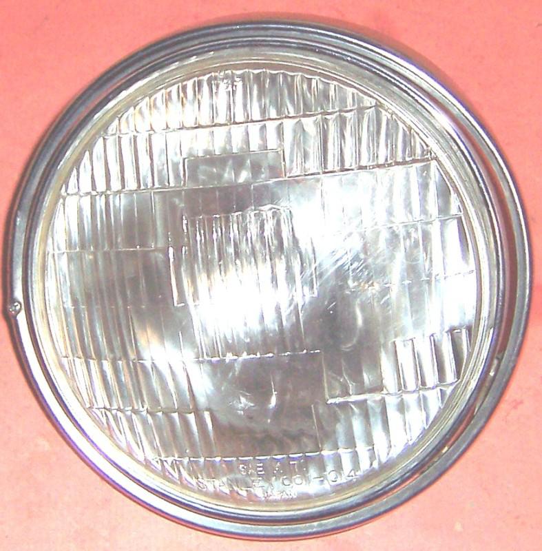 1976 honda cb500t headlight and headlight trim ring head light tested works good