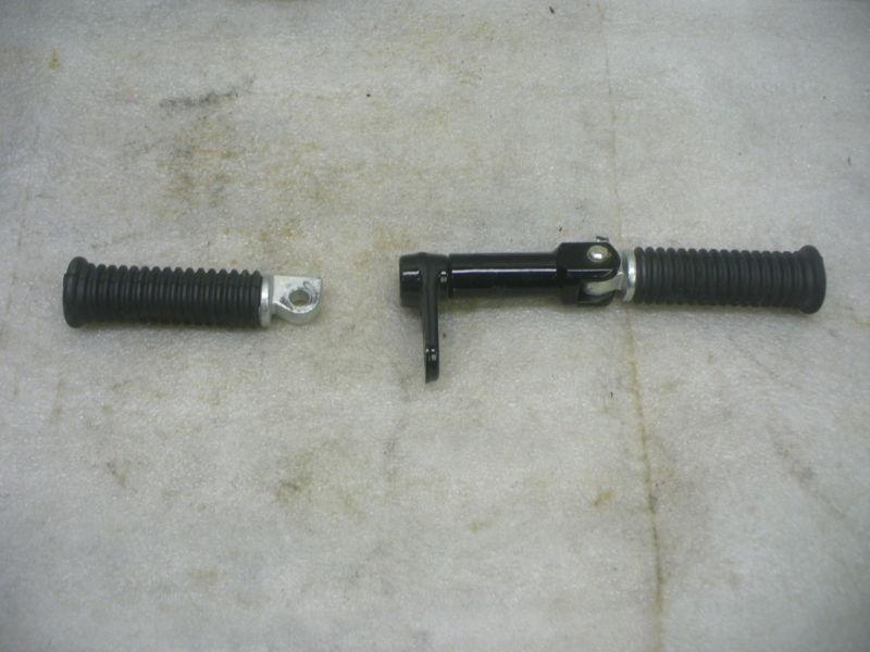 Harley 2010 xl 883 passenger foot pegs,one bracket & one pin.