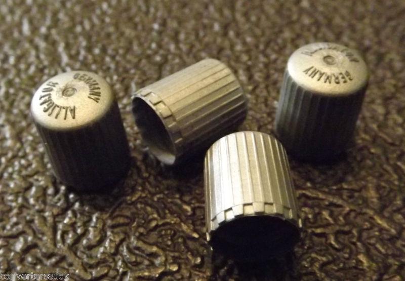 Tpms wheel  tire  valve stem cap set  of 4   gray  valve stem caps