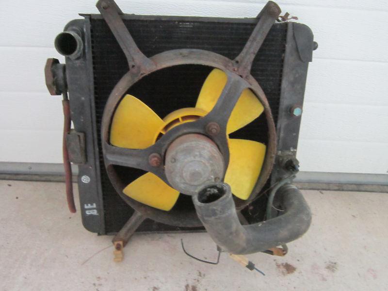 Yugo gvx gv & fiat 128 radiator & cooling fan in good shape complete look photos