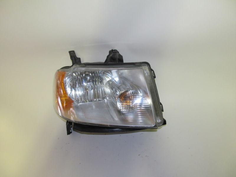 05 06 07 ford freestyle oem right headlight nice! 