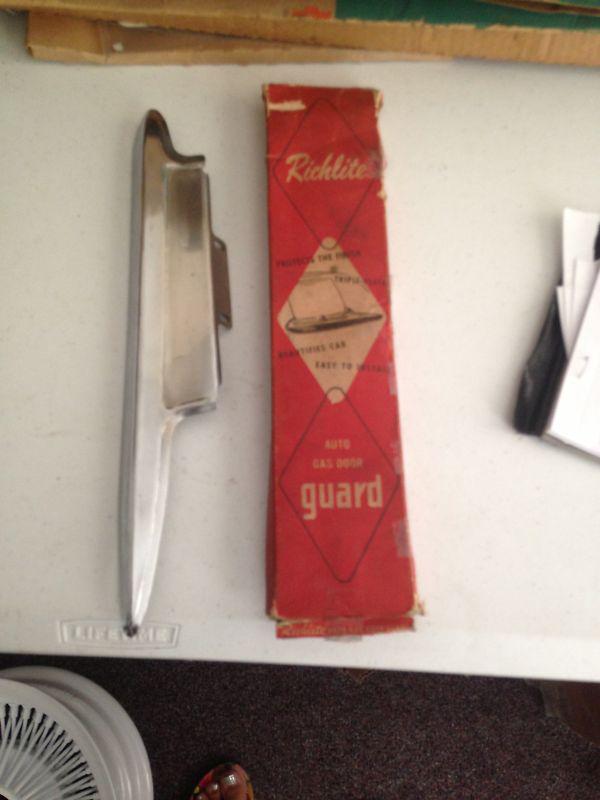 Nos chevy,gmc,ford,mercury,buick,lincoln,olds, richlite gas door guard 1940-1969