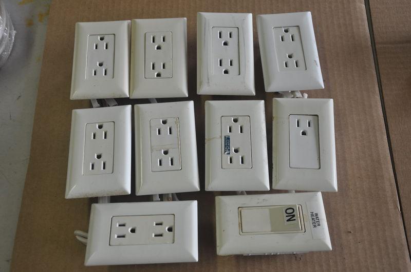 9 used rv white receptical 1 used water heater switch 120 volt av