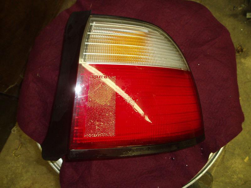 97 98 accord 4 door right passenger tail light used 