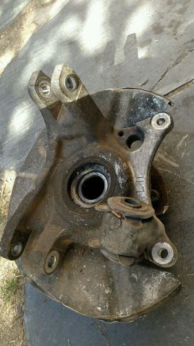 87 mazda rx-7 left  side rear hub 4 lug knuckle  assembly, used