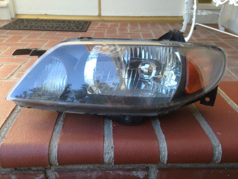 01 02 03 03 mazda protege left headlight oem, factory