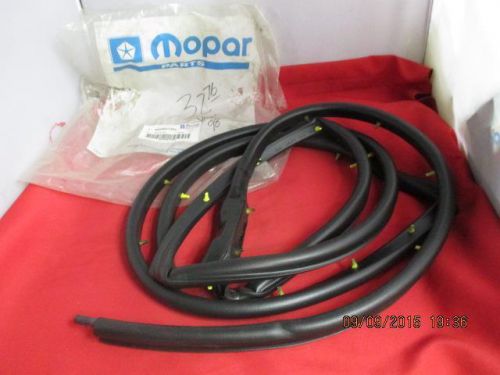 Left front door weatherstrip fits 98-01 van wagon full size nos mopar 55346677ah