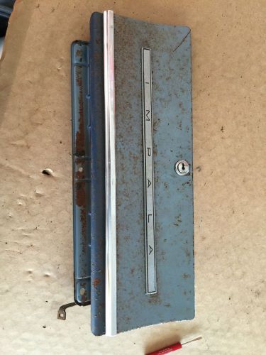 1965 impala glove box door with trim 65