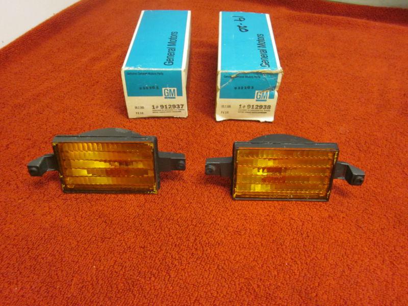 Nos gm 1976 1977 pontiac sunbird parking light lens left right lh rh n.o.s. new