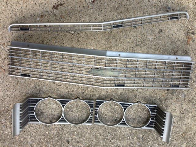 Oem 1969 1970 chevrolet  caprice upper and lower grill with headlight covers 