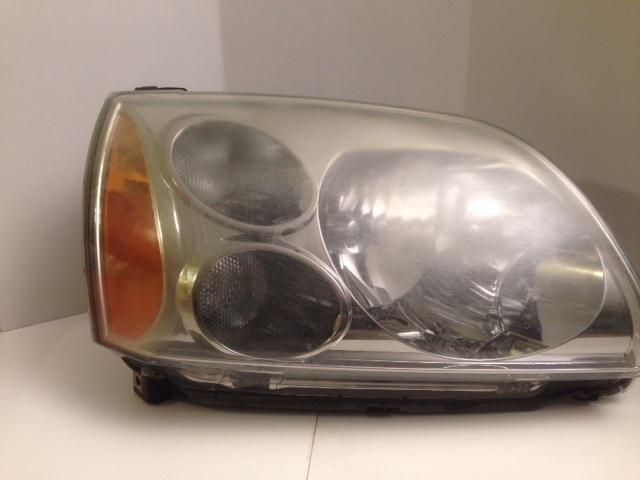 2004 mitsubishi galant left headlight assembly  used