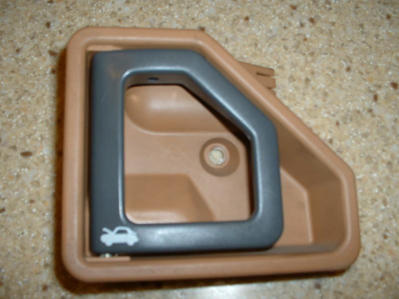 Volvo hood release handle, from a  1992 960,  beige