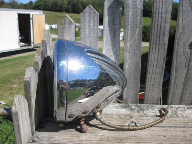 1930's/1940's guide headlight/triangle at tip of bezel/1900's vintage car/gm