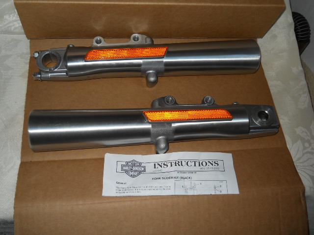 Harley-davidson touring fork sliders p n 46502-09 r &  46495-09 l  new