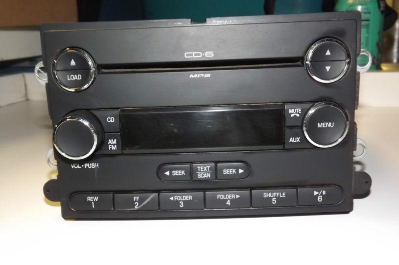 2009 dodge caravan am fm cd aux radio p68021157ad oem