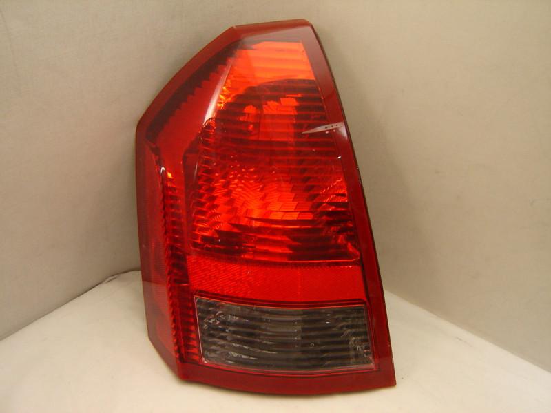 Chrysler 300 left tail light 05 06 07 oem