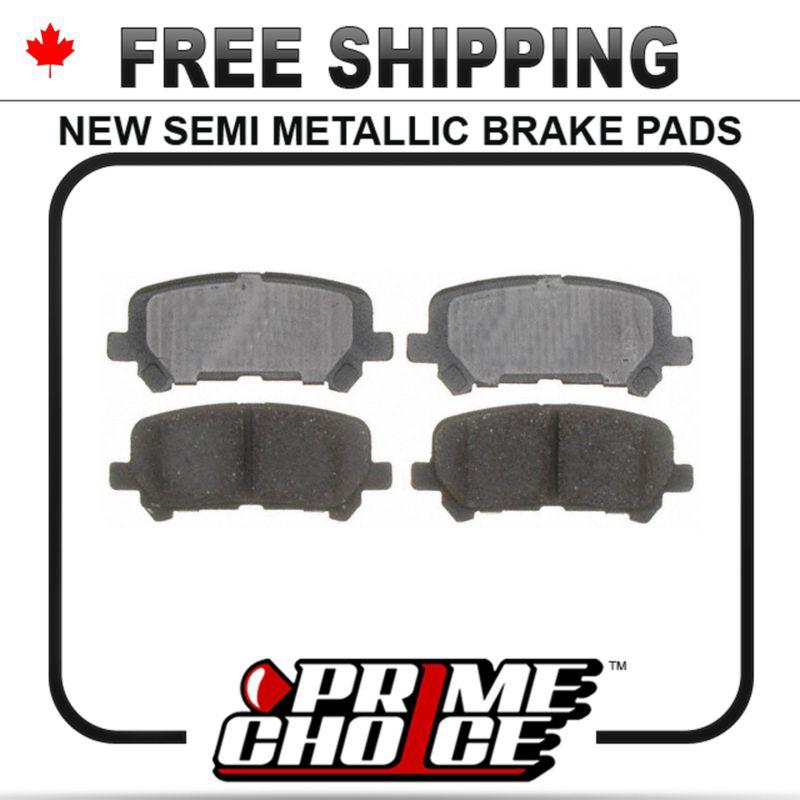 New premium complete set of rear metallic disc brake pads with shims