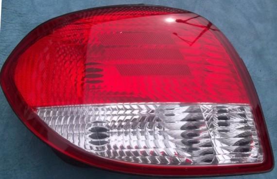 2000 left side hyundai tiburon tail light lens assembly