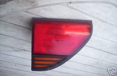 1994 1995 mitsubishi diamante lid tail light drivers side ( left ) free s/h oem