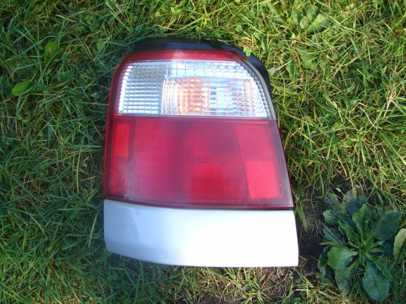 2001 2002 forester tail light assembly complete lh silver mldg.