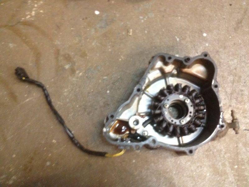 02 kawasaki bayou 220 stator generator and cover motor engine 