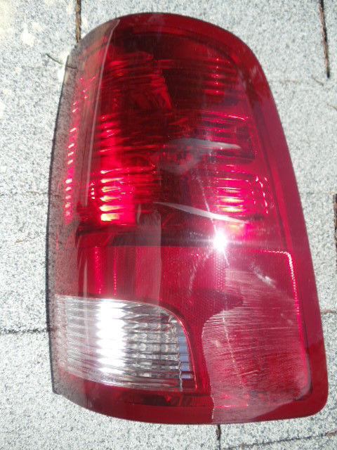 Mopar 55277414ab 2011 dodge ram slt extended cab right side tail lamp **used** 