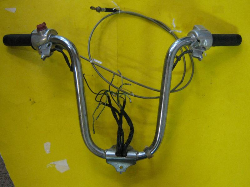 1978-80 honda express moped handlebars with most accessories included.