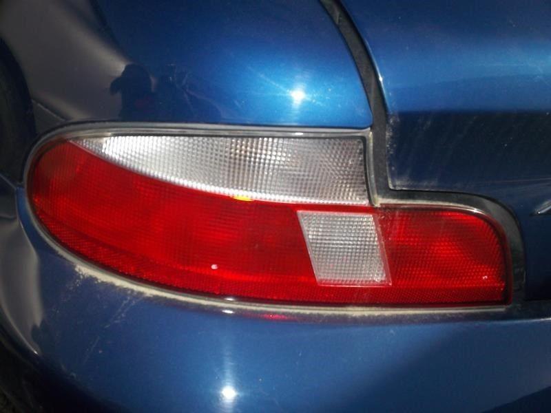 Left taillight for 99 00 01 02 bmw z3 ~ rdstr clear lens 2.5l 4729204