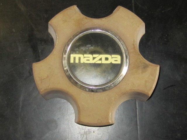 Mazda original equipment wheel center cap oe# g21337191