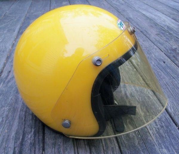 Vintage motorcycle helmet pip sunburst orange open face with yellow tint shield