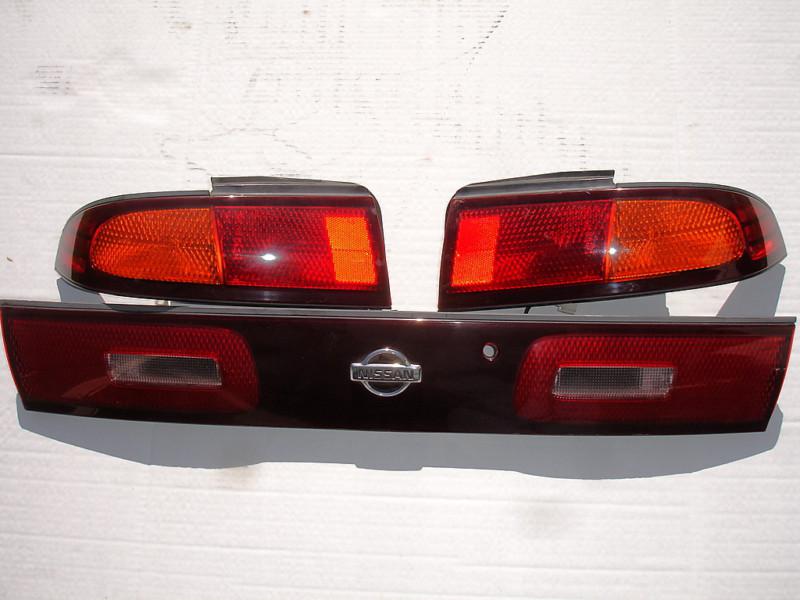 Jdm nissan silvia s14 oem rear tail lights+ center garnish nissan 240sx silvia