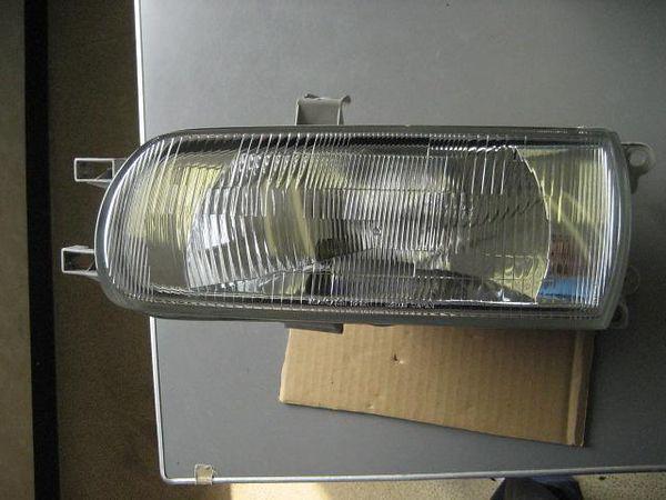 Toyota tercel 1994 left head light assembly [0210900]