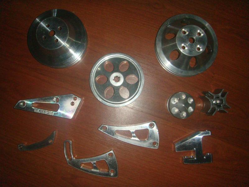 Assortment ofchevrolet small block pulleys and brackets-polished aluminum