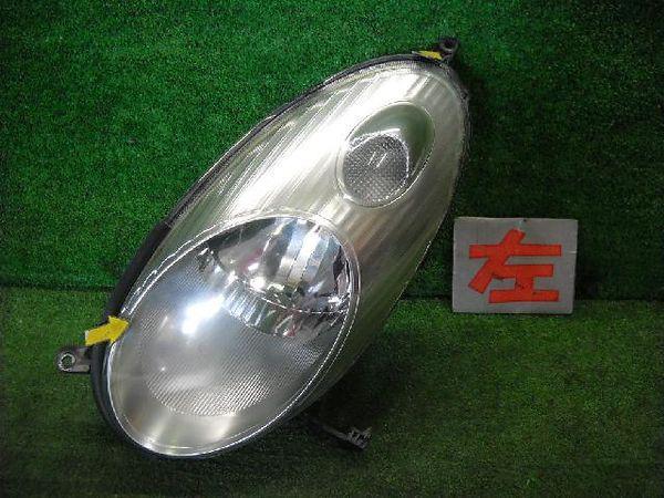 Nissan march 2002 left head light assembly [9710900]