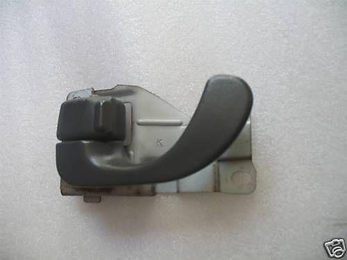 1997-2002 mitsubishi mirage interior left door handle 