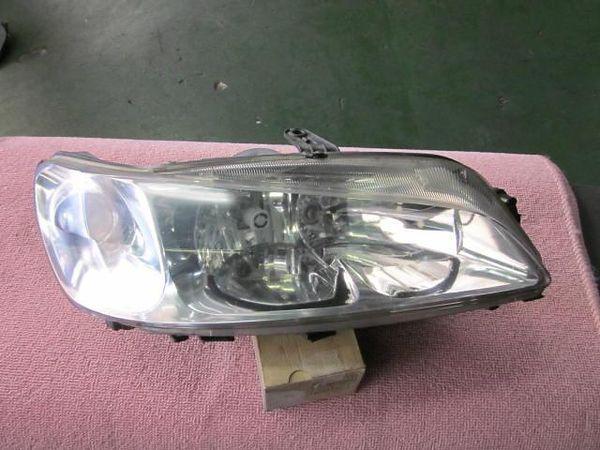 Peugeot 306  right head light assembled [0110800]