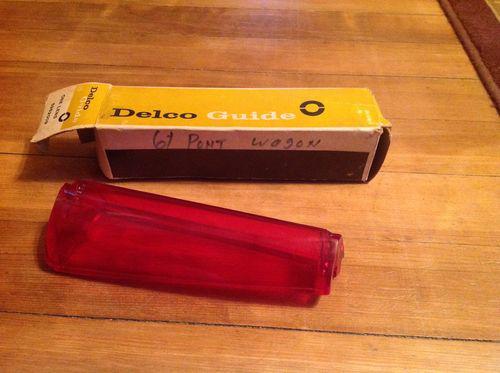 1961 pontiac bonneville-catalina wagon left side tail lens in orig. box not repo