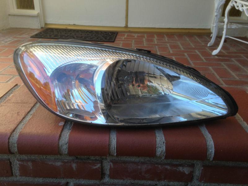 00 02 03 04 05 06 07 ford taurus se right headlight oem, factory