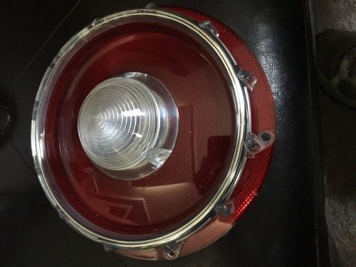 Pair 1 oem 1 repro 1957 ford fairlane tail light bezel and lenses