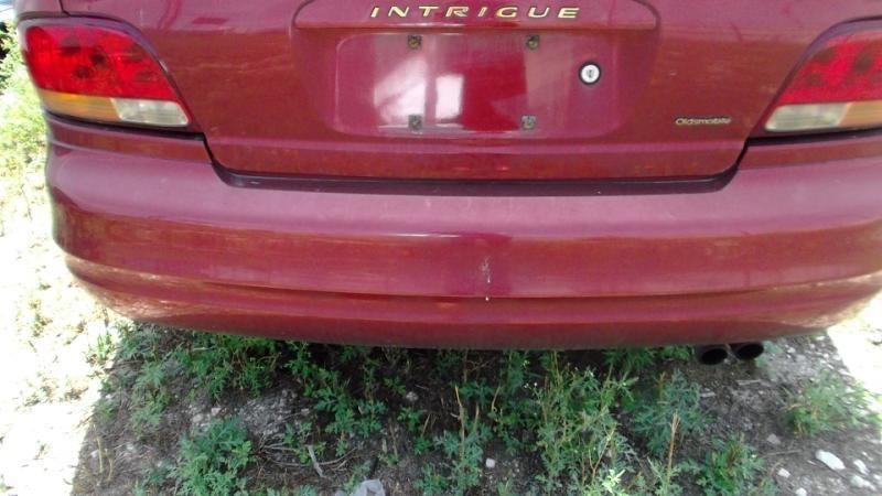 98 99 00 01 02 intrigue rear bumper assembly w/ reinforcement impact bar