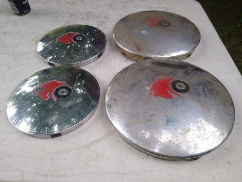 Wheel horse hub caps with red horse logo