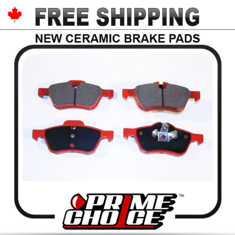 New premium complete set of front ceramic disc brake pads with shims