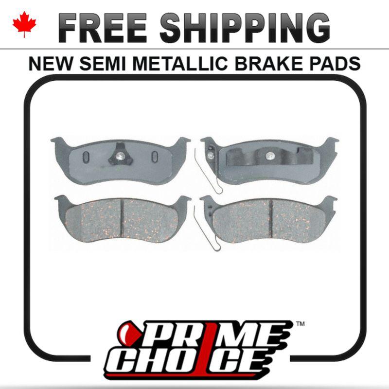 New premium complete set of rear metallic disc brake pads with shims